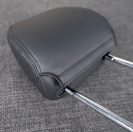 Volkswagen headrest cover fastening design