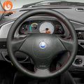 MEWANT black pu leather steering wheel cover with red stitching fitted inside a Fiat, SKU 00034011P1102