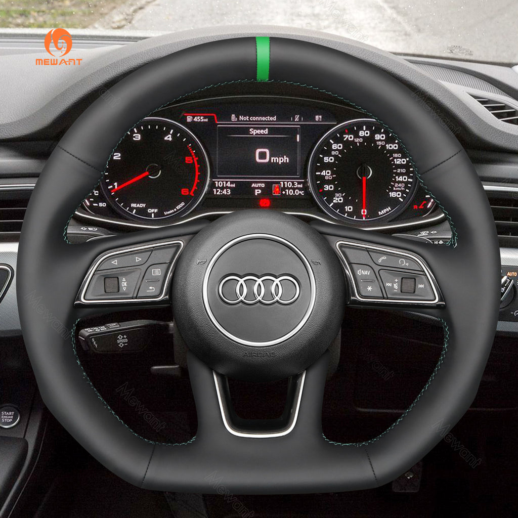 MEWANT pu leather cover on an Audi steering wheel inside the car, with green center stripe and MEWANT logo