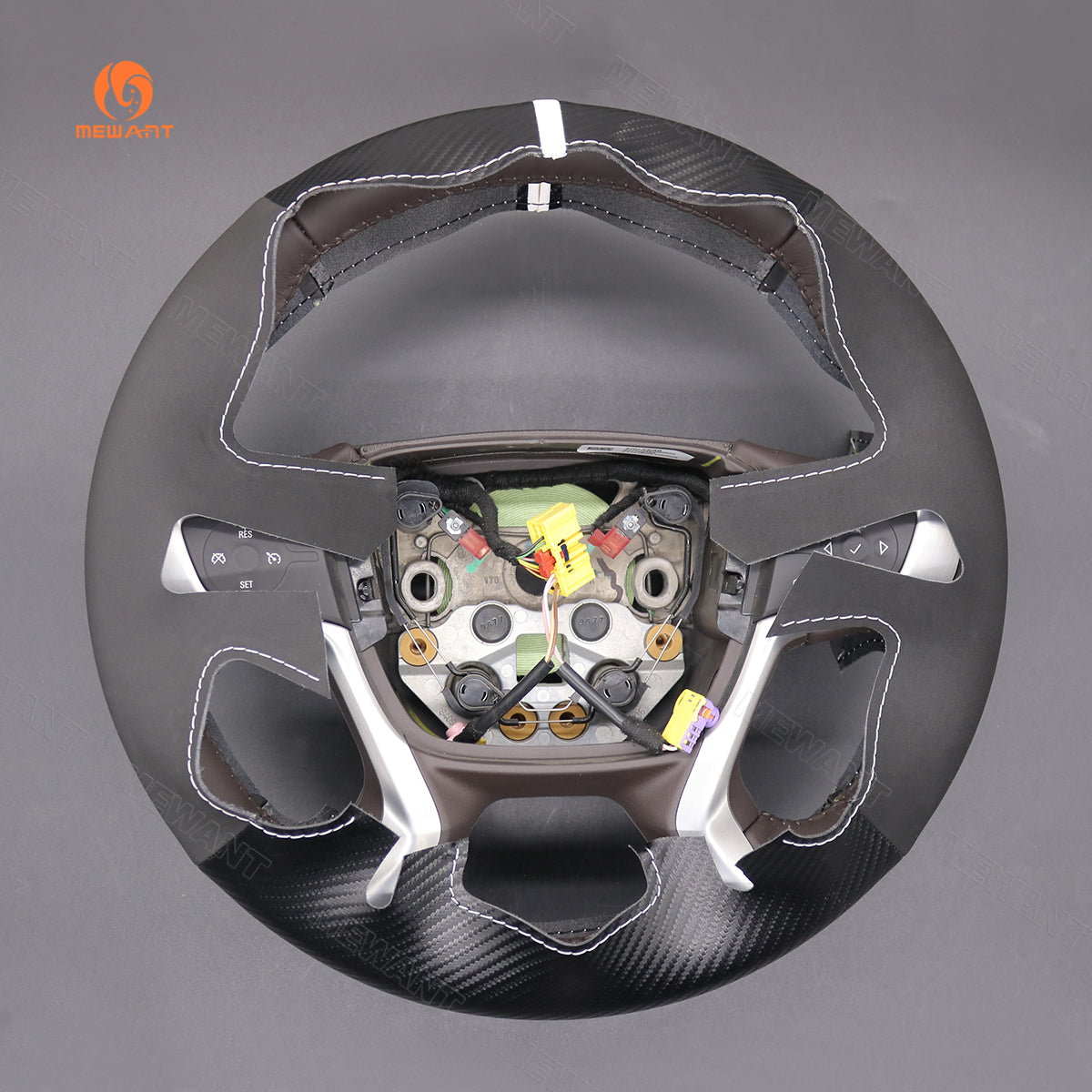 Rear view of MEWANT matte carbon fiber and Athsuede GMC steering wheel cover